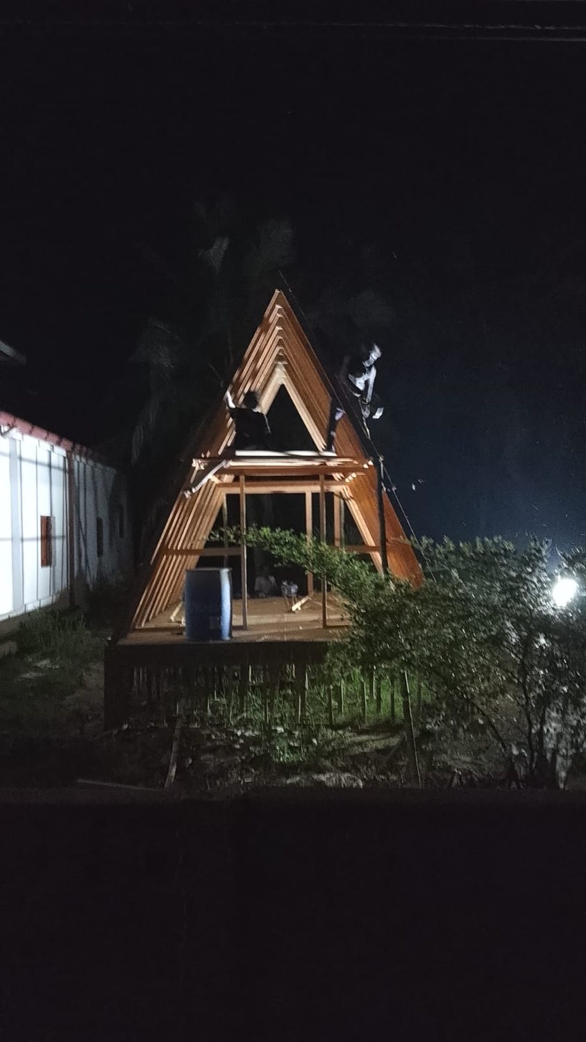 A-frame structure illuminated at night